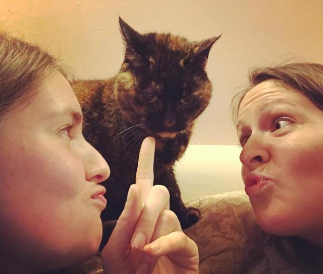 Sisters and cat